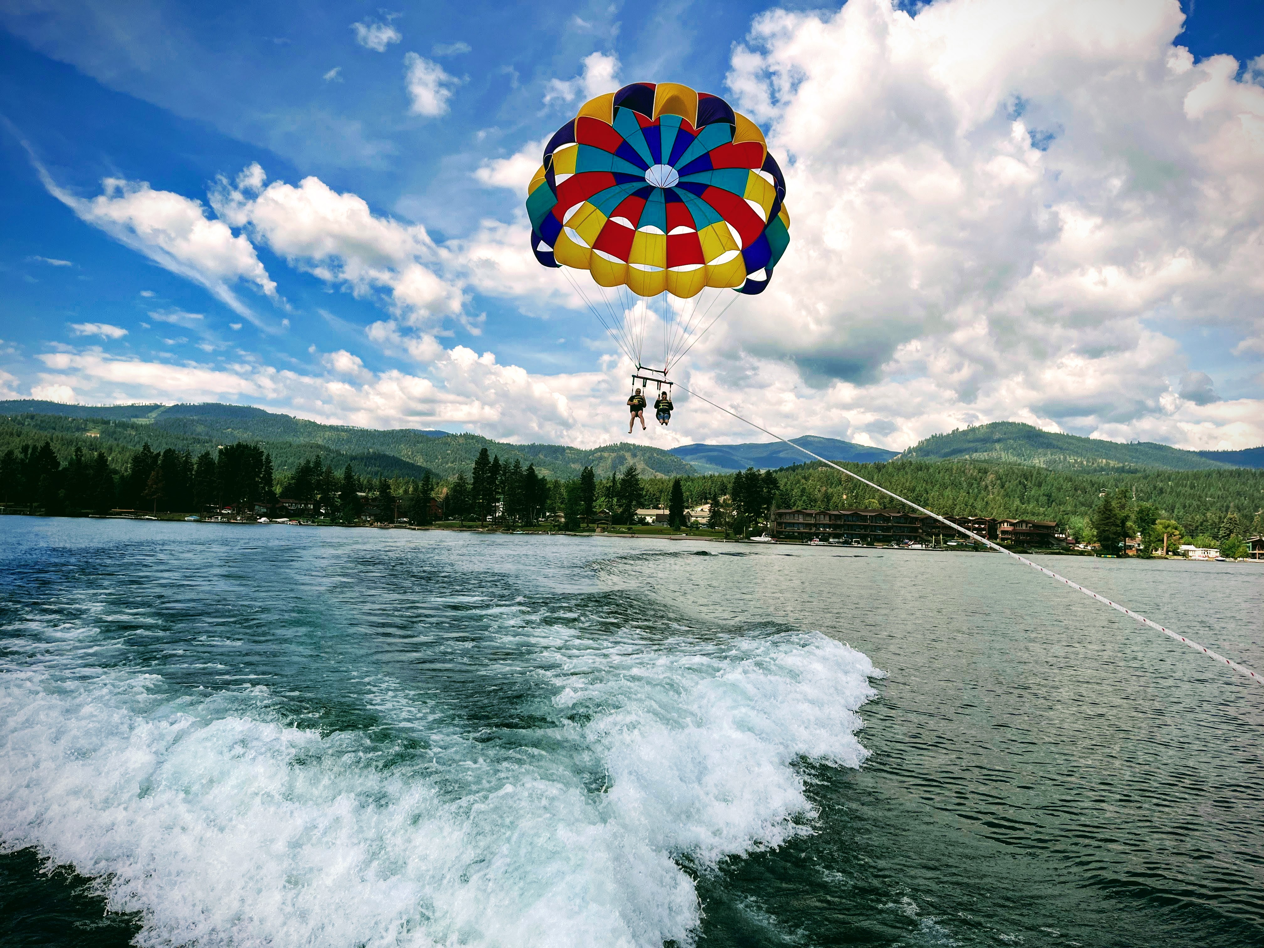 Colorful chute against blue Montana sky