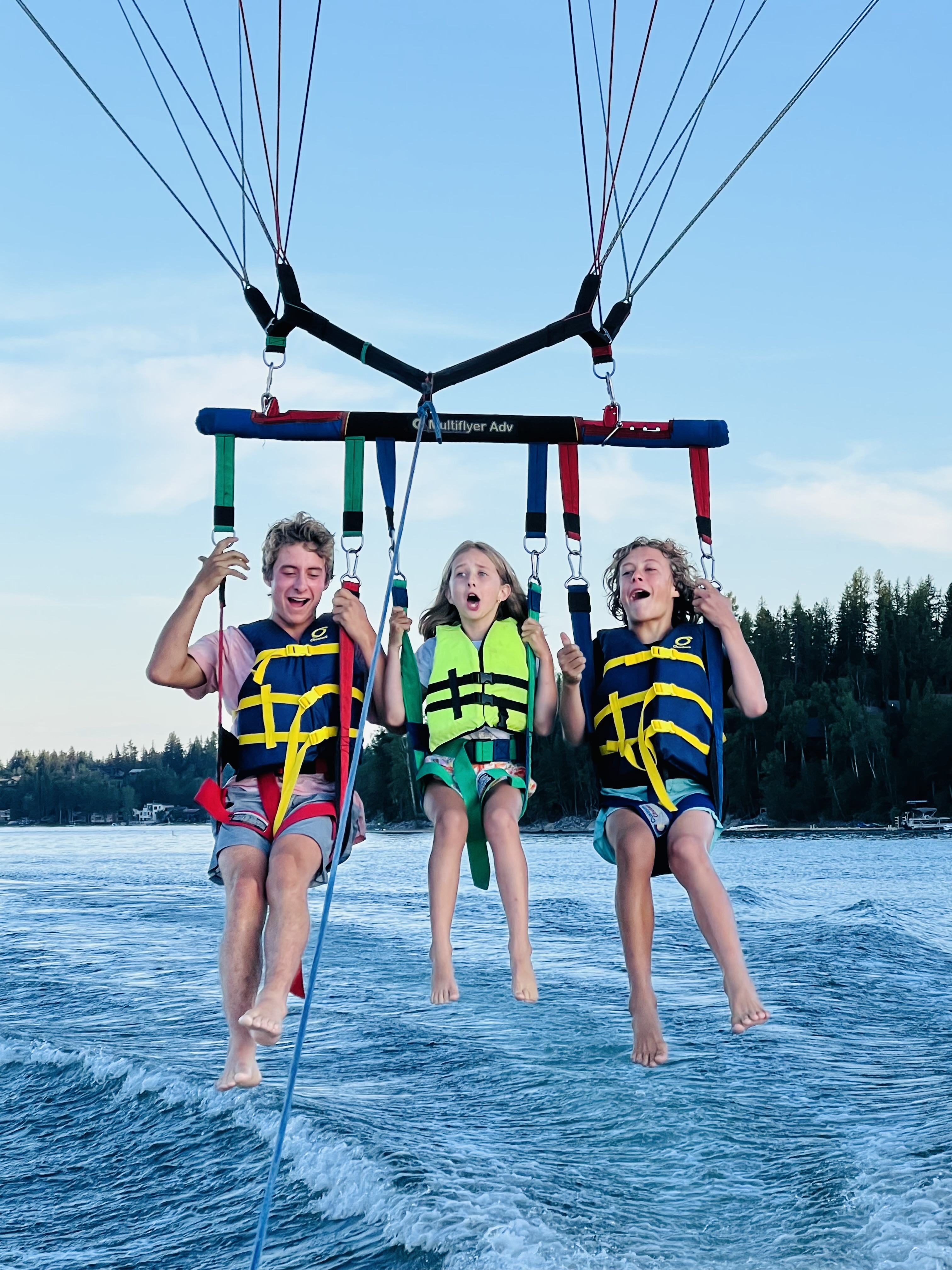 Three kids having the time of their lives
